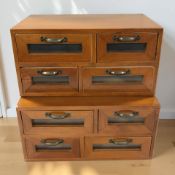 A pair of reproduction stacking four drawer chests, fitted with drawers, overall height 30 cm.