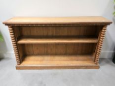 An early 20th century oak open bookcase,
