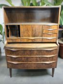 A 20th century Scandinavian walnut bow front bureau, 102 cm x 46 cm x 143 cm.