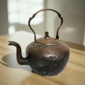 A large Georgian copper kettle, height 35 cm.
