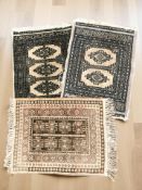 Three Middle Eastern woolen mats,