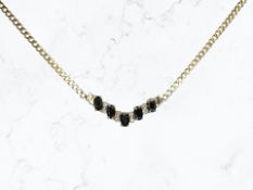 A 9ct gold sapphire and diamond necklace, length 42.