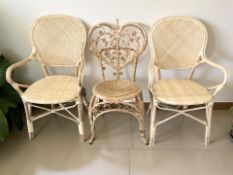 A pair of bentwood and wicker armchairs plus a similar chair
