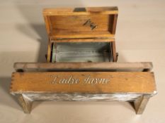 A walnut caddy and a counter topped display box marked 'Ladye Jayne' width 46 cm
