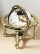 A gemstone globe,