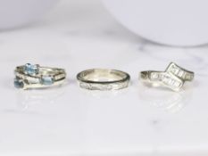 Three silver dress rings (3)