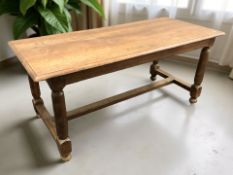 An oak refectory low table,