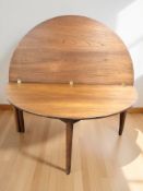 A 1970's teak fold over gateleg coffee table,