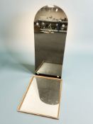 A smoked glass clock mirror,