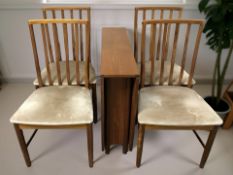 A 1970's teak drop leaf table width 92 cm and a set of four chairs