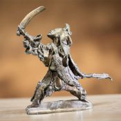 A Chinese patinated metal figure of a warrior,