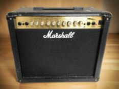 A Marshall MG series 30DFX amplifier with lead
