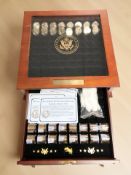 A coin collector's cabinet containing a large quantity of American uncirculated Statehood