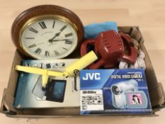 A quartz timepiece, JVC video camera,