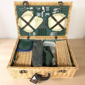 A picnic hamper and contents