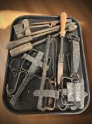 A group of metal wares, iron gin traps,