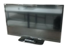 A Logik 46 inch LCD TV with lead and remote
