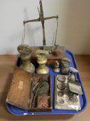 A group of antique scales and graduated weights