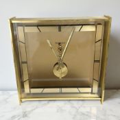 A Jaeger-Lecoultre gilt-metal and smoked-glass mantel timepiece,