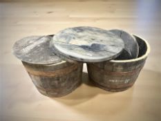 A pair of coopered oak barrel planters,