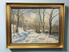 Danish School : A snow covered woodland road, oil on canvas,