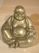 A Chinese brass figure of Buddha,