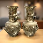 A pair of Chinese brass vases,