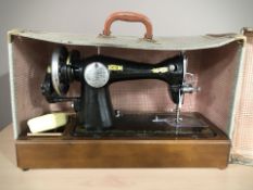 An antique hand sewing machine