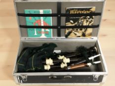 A set of Scottish blackwood and celluloid bagpipes, apparently unmarked,