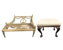 A gilt and painted chaise longue, length 122 cm (cane work as found),