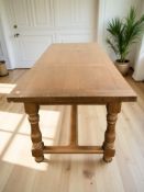 A 20th century oak refectory dining table,