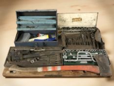 A quantity of vintage tools, enamel tool boxes, large axe,