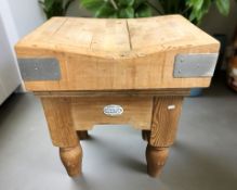 A pine butcher's block with maker's plaque 'Spence & Co.