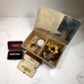 A Victorian garnet and seed pearl bar brooch and a further brooch, both stamped 9ct,