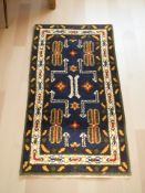 An Eastern woolen rug,