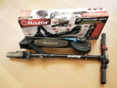 A Razor electric scooter in box CONDITION REPORT: needs attention - sold as seen