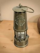 An Eccles Protector miner's safety lamp