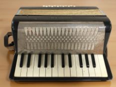 A Hohner Mignon II accordian
