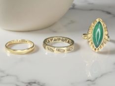 An 18ct yellow gold band ring size L,