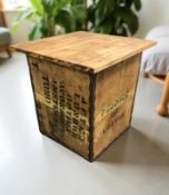 A tea chest converted into an occasional table,