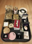 A group of mantel timepieces, compacts, silver crucifix pendant, other costume jewellery items,
