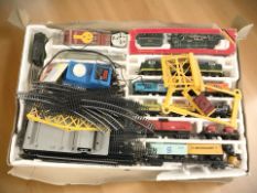 A group of Hornby and Lima OO gauge rolling stock, track, control unit,