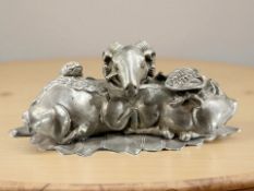 A Chinese silvered metal figure of a ram,