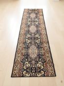 A machine made runner of Iranian design,