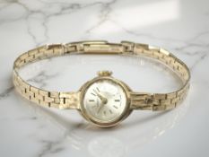 A lady's 9ct yellow gold Caravelle Swiss wristwatch CONDITION REPORT: Fully 9ct gold