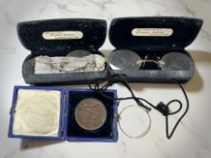 Two pairs of antique spectacles, a lorgnette, and a shooting medal awarded to Pte. C.W.G.