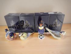 Four Royal Crown Derby porcelain bird paperweights to include bee eater, bullfinch,