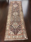 A Hamadan runner, North-West Iran, 312 cm x 105 cm.