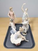 Five Nao figures including seated ballerina, flamenco dancer, etc.