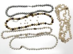 Two pearl necklaces with 14ct gold clasps and three others with 9ct gold clasps (one broken)